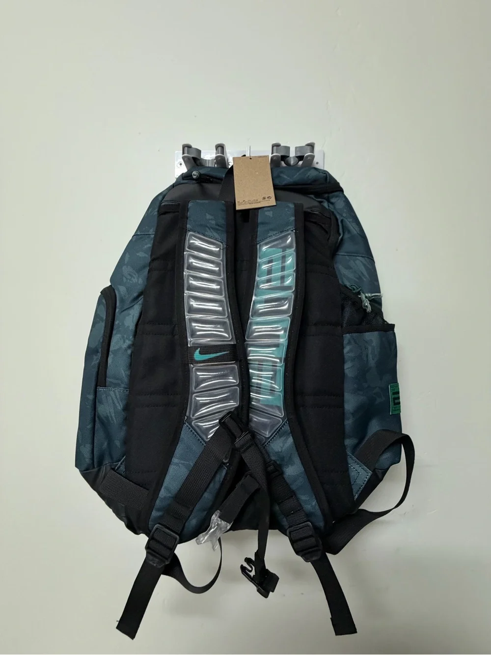Nike Men's Dark Gray Backpack with Teal Accents